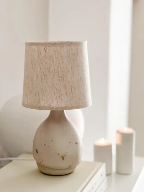Natural ceramic ‘flecked’ lamp with linen shade