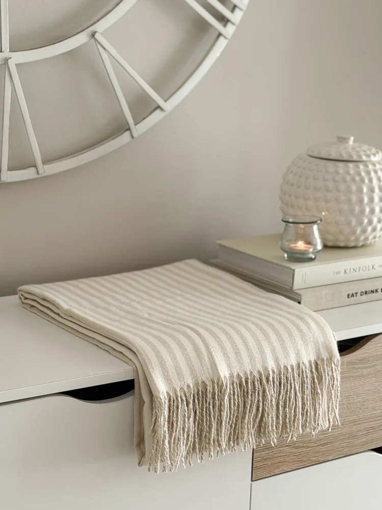 Softest stripe throw in latte