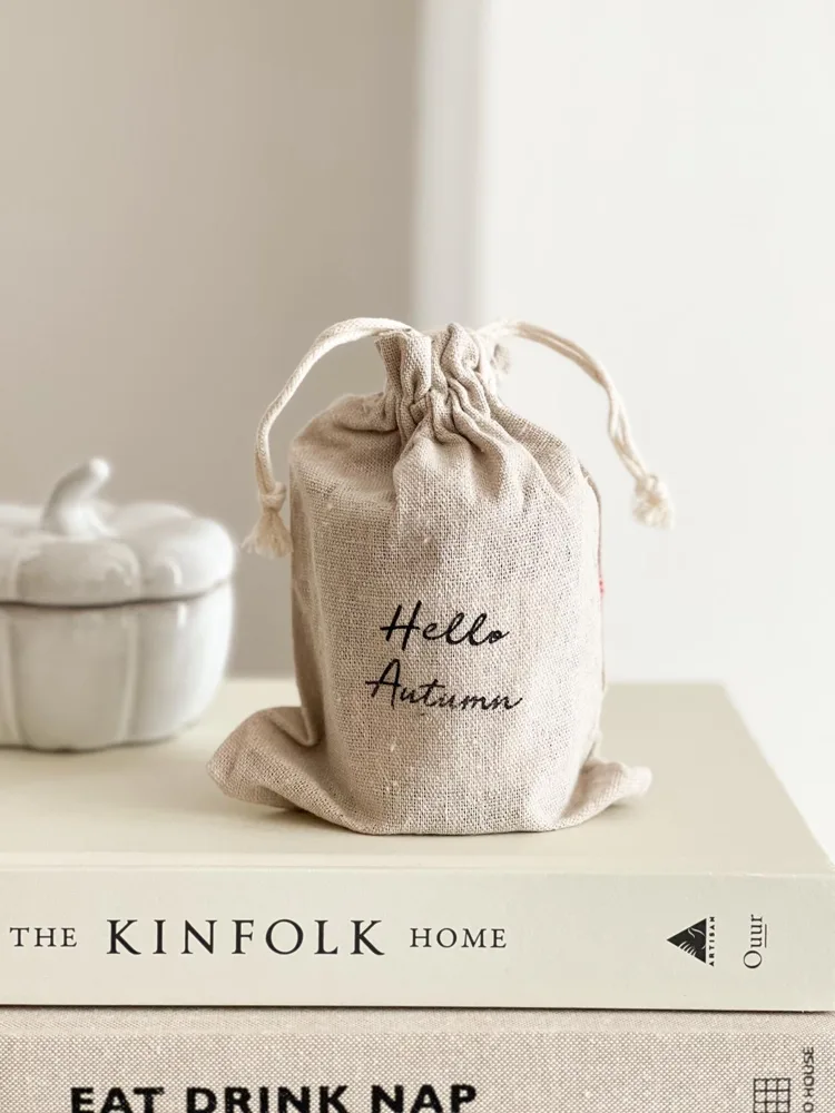 Hello Autumn scented candle in hessian bag