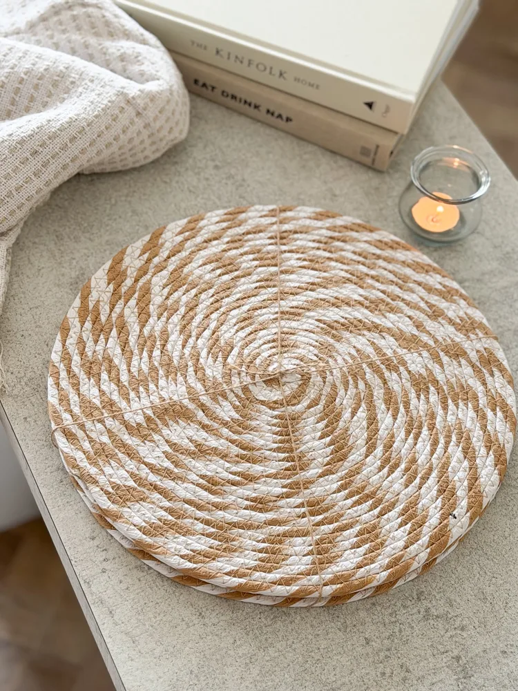 Set of four natural & white woven placemats