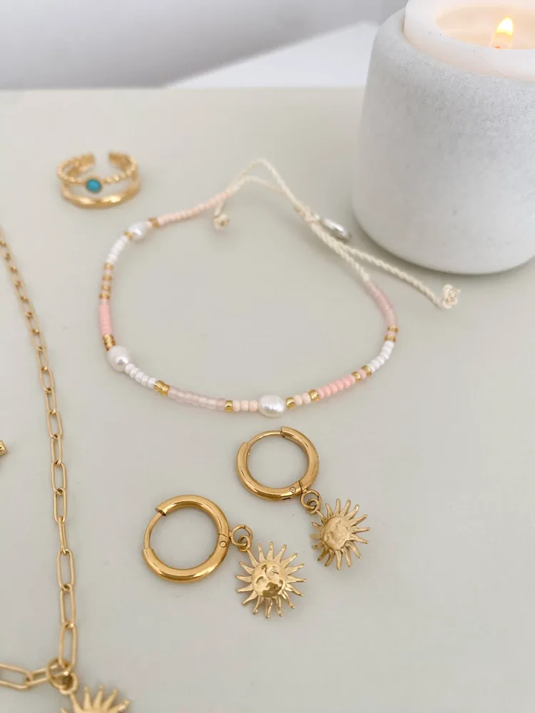 Sun charm earrings