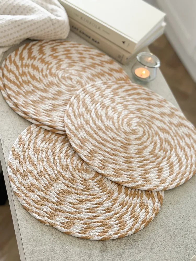 Set of four natural & white woven placemats