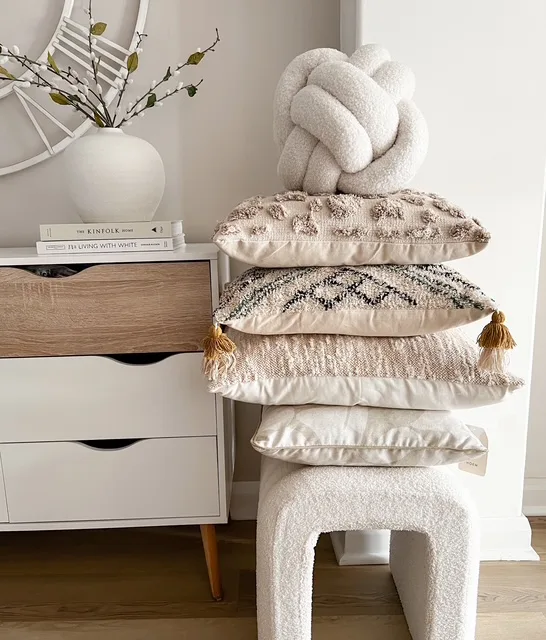 Large cream Nordic boucle knot cushion