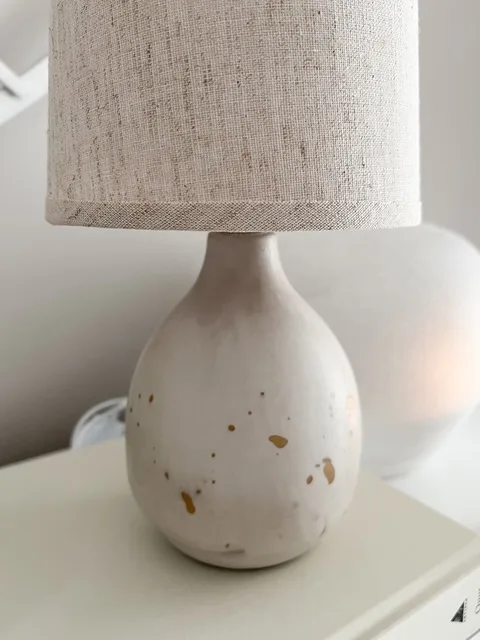 Natural ceramic ‘flecked’ lamp with linen shade