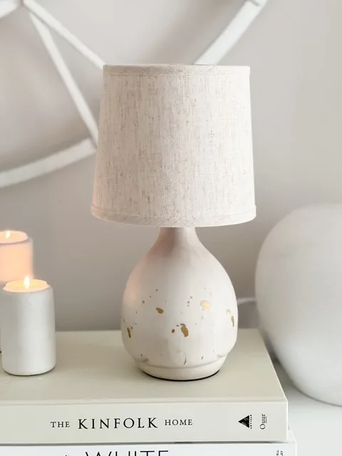 Natural ceramic ‘flecked’ lamp with linen shade